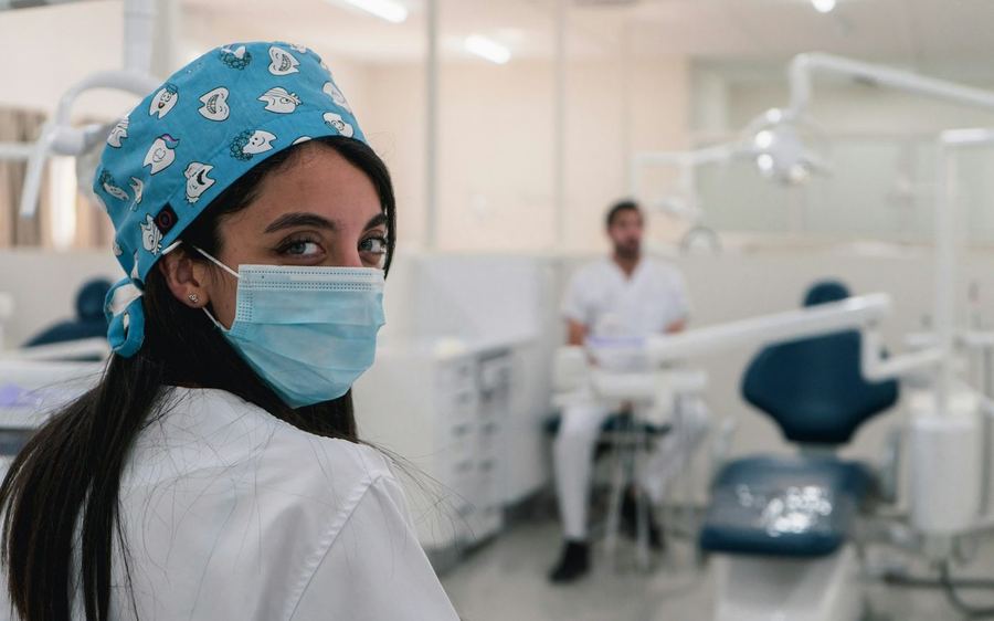 Dentist at work in a treatment room